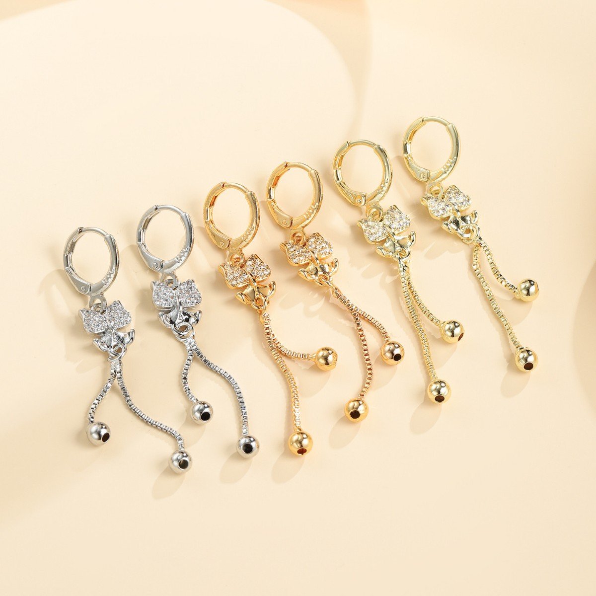 Cross border popular zircon inlaid with natural stone, long flowing Su Kaiflar gold-plated earrings with fashionable temperament, niche ears